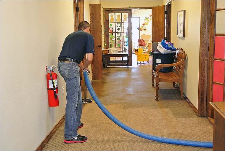 carpet damage restoration water cleaning wet services flood dry clean drying repair carpets flooded flooding dki florida worker removal company