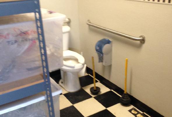 Toilet Overflow Causing Water Damage to Business in Fort Worth, TX