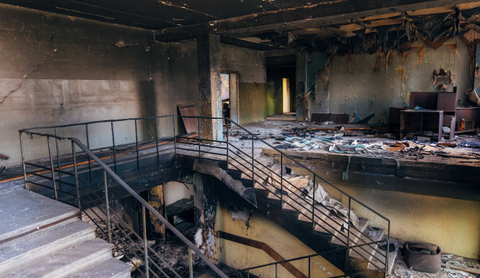 a fire damaged interior of a building