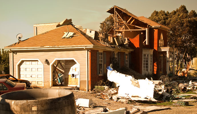 a house damaged by the aftermath of a storm