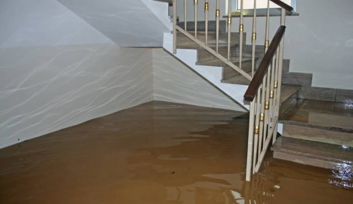 Water damaged house with the stairwell flooded.