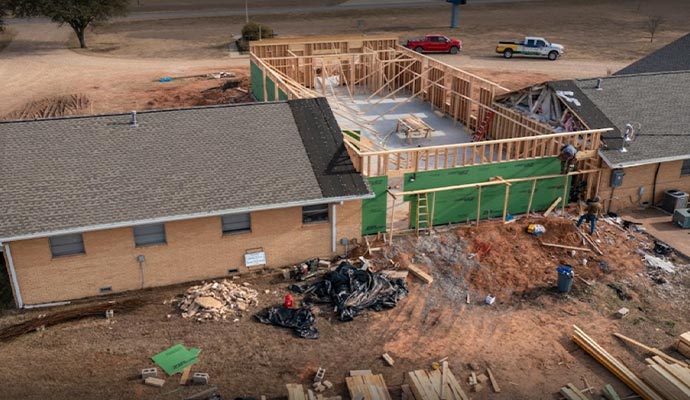 A house under reconstruction with new wooden frame