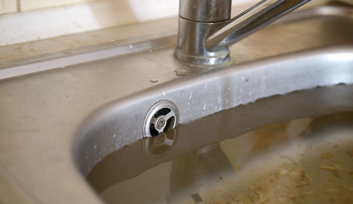 prevent kitchen sink overflow