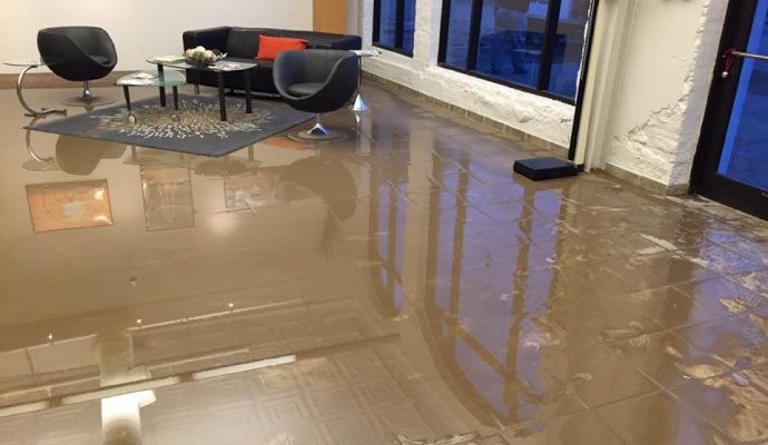 Water damaged floor inside room Water damaged floor inside room